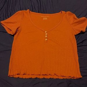 Pink/ rose pink American eagle cropped top.